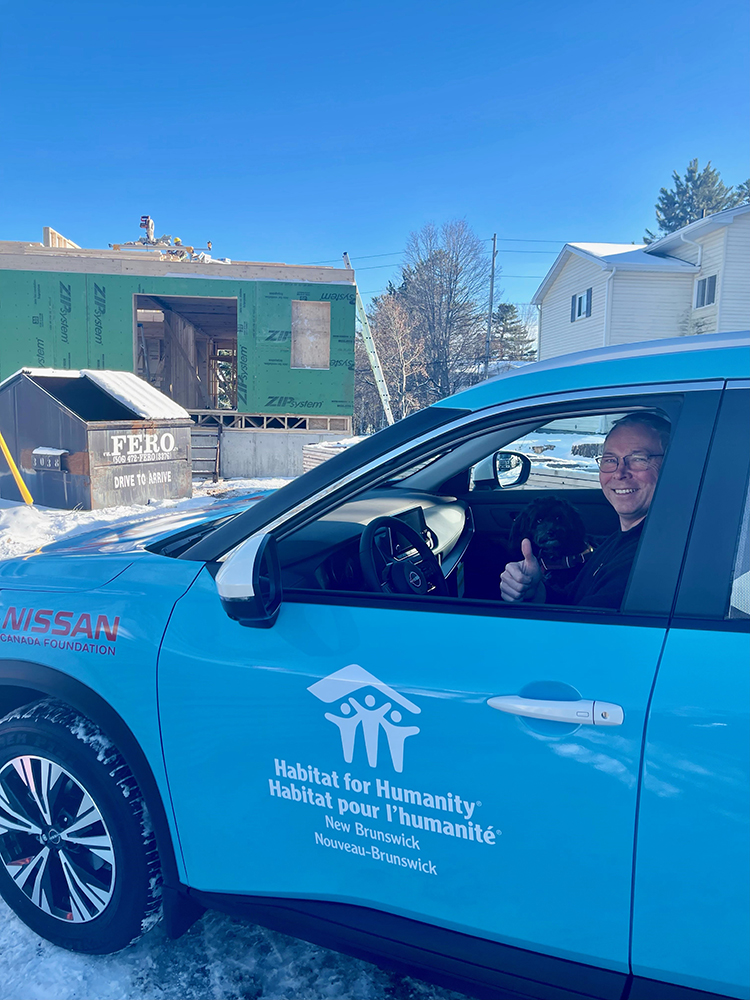 Nissan Canada Foundation and Habitat for Humanity NB branded Nissan Rogue on site