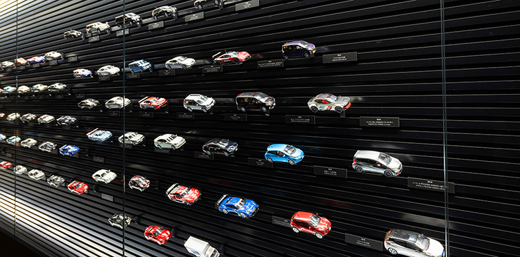 This display shows Nissan's history in miniature, featuring more than 100 model cars spanning the company's history.