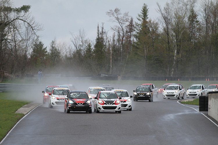 A group of Nissan Micra Cup cars at Calabogie Motorsports Park in Ontario.
