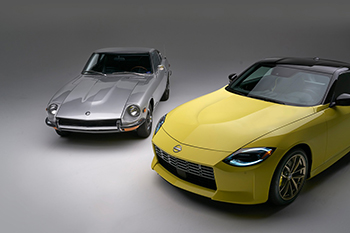 front view of a new nissan z and a heritage nissan