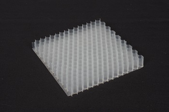 Nissan's acoustic meta-material, a slanted white plastic sheet on a black surface