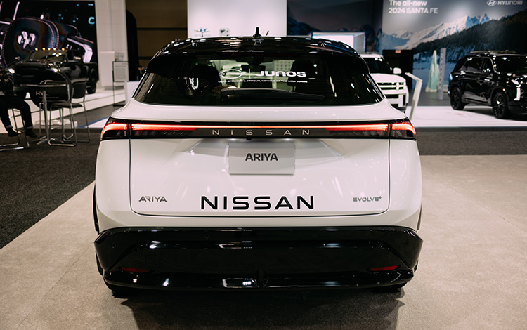 Rear view of the 2024 Nissan ARIYA adorned with JUNOS branding