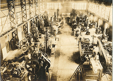 old photo of workers in a factory